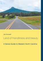 Land of friendliness and beauty Cover des Buches Land of friendliness and beauty (ISBN: 9788743013976)