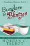 Burglars & Blintzes (Moorehaven Mysteries) Cover des Buches Burglars & Blintzes (Moorehaven Mysteries) (ISBN: 9781948051149)